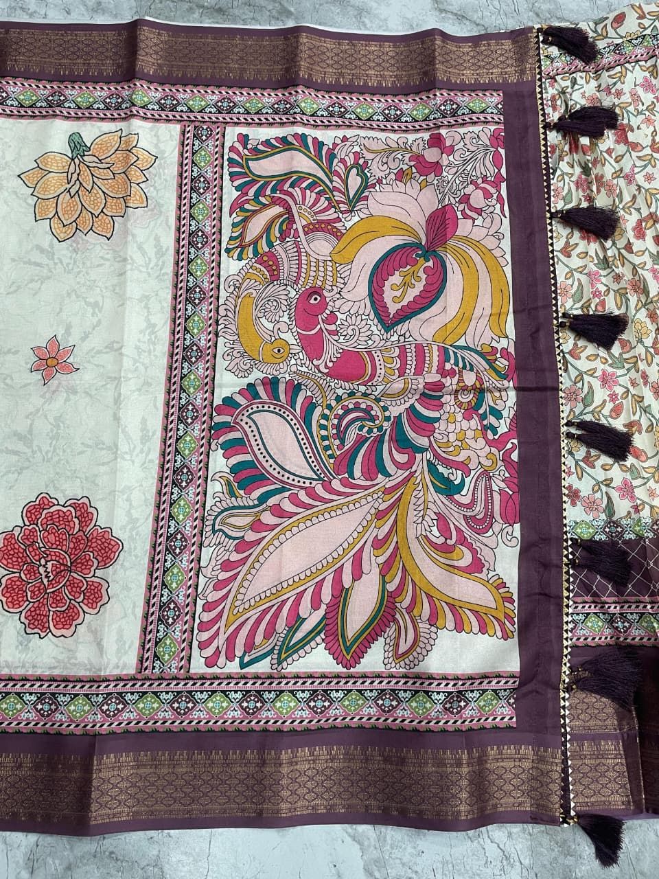 Cream Patola Lehenga with Detailed Kalamkari Peacock Pallu and Rich Purple Zari Borders