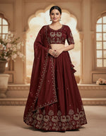 Metaphysical Maroon: Gilded Peacock Lehenga and Choli with Zardozi Work