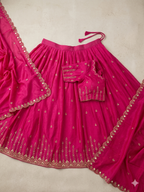 Elegant Silk Lehenga Set with intricate gold floral embroidery
