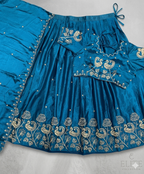 Radiant Teal Blue Silk Lehenga Choli with Traditional Peacock Zari Embroidery