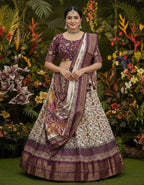 Cream Patola Lehenga with Detailed Kalamkari Peacock Pallu and Rich Purple Zari Borders
