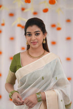 Elegance in Tradition Minimalist White and Olive Green Handloom Saree