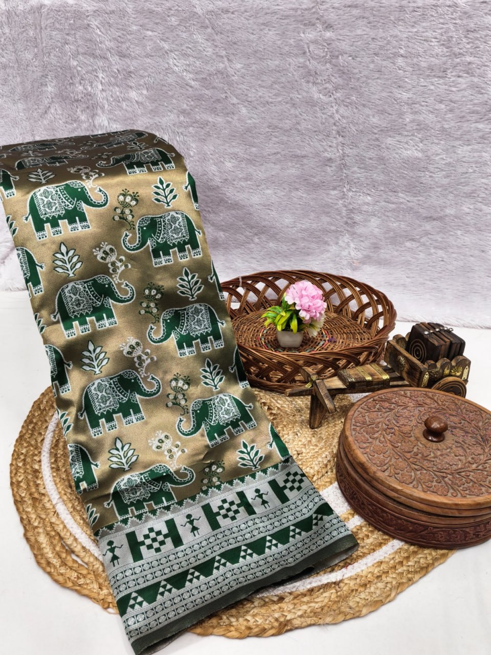 Elegant Green Elephant Motif Saree