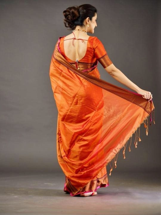 Radiant Orange Silk Saree with Rich Contrast Border